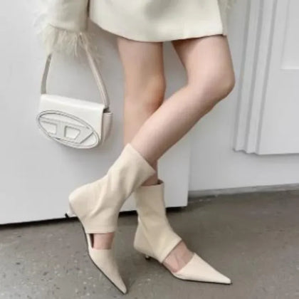Minimal Pointed Boots